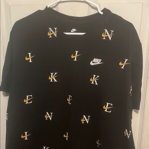 Nike Black Graphic Tee with Orange Accents